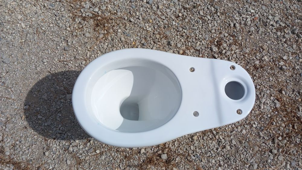 Sanita nova na caixa da marca a sequa