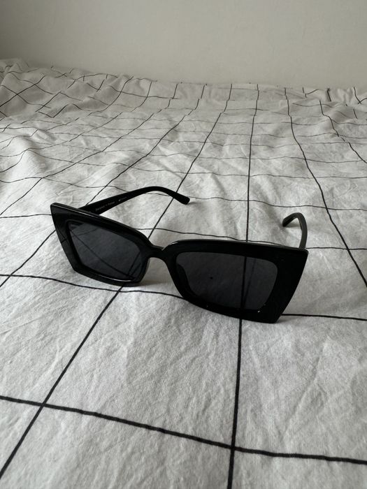 Oculos de sol pretos