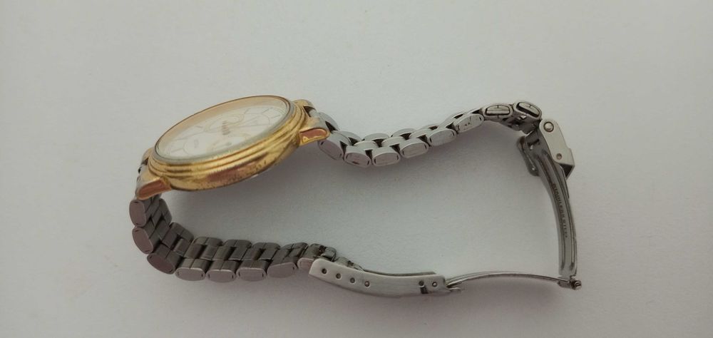 Pulsar dourado quartz 40€