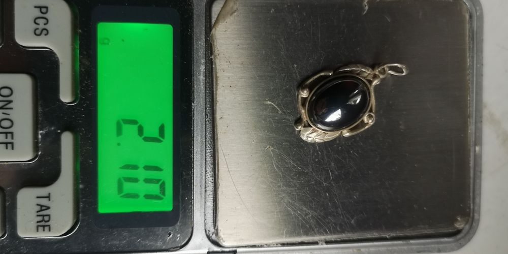 Srebrna zawieszka owalny hematyt pr.925 waga 2,10 g