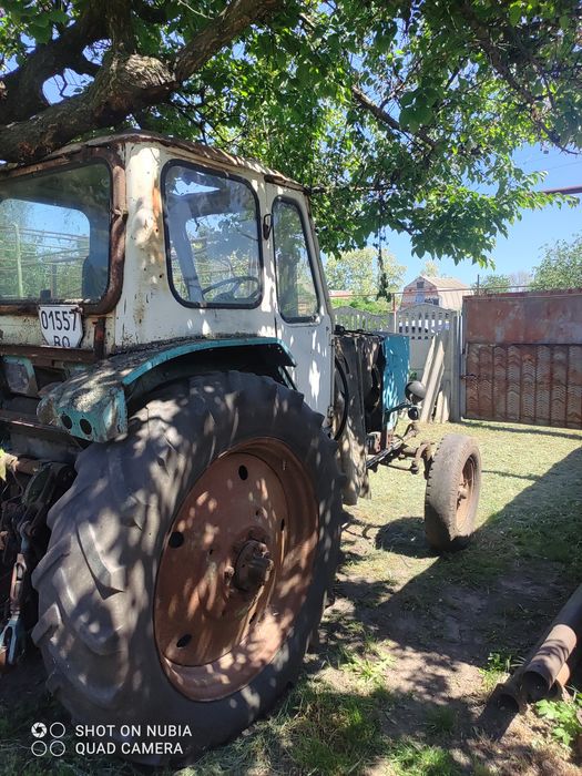 Трактор ЮМЗ-6, плуг ПН 3-35, міжрядний культиватор, бочка залізна