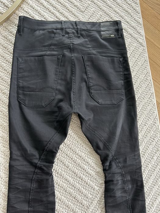 Jeansy męskie powlekane Jack & Jones woskowane czarne anti fit dan