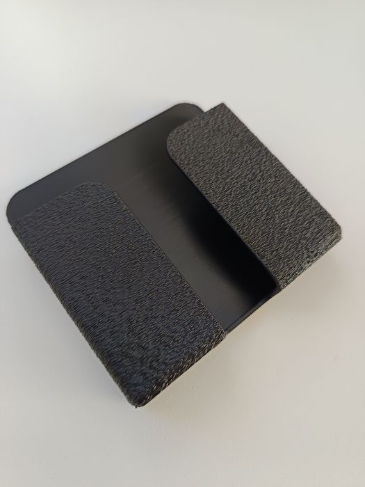 Suporte de parede para telemóvel