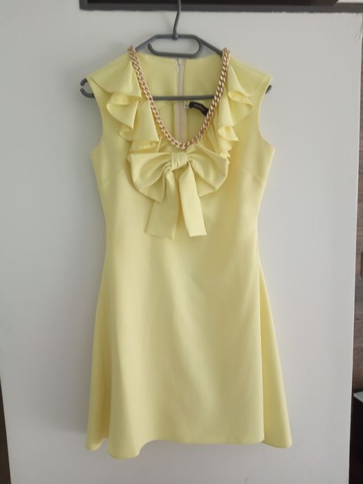 Sukienka Marelina żółta, pastelowa, kokarda, asymetryczna, złota