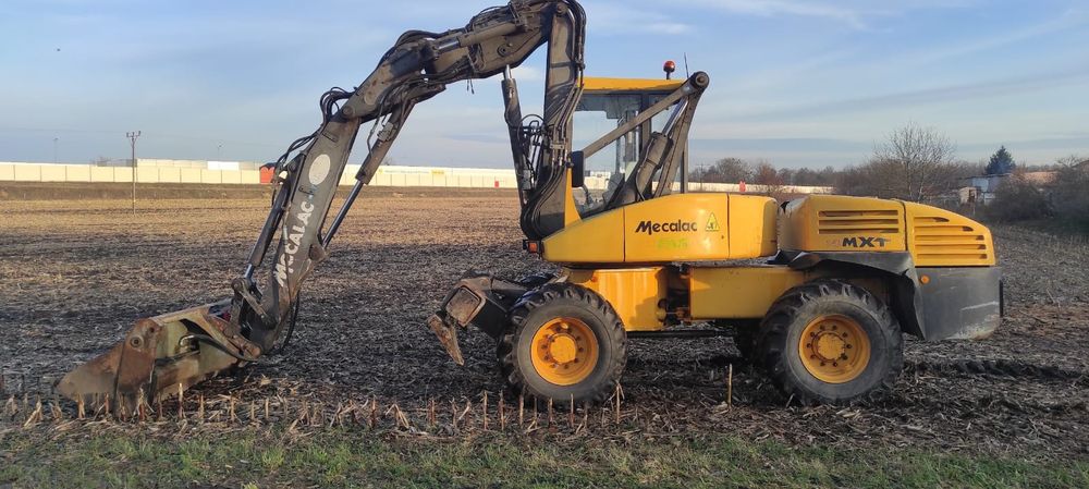 Usługi koparko ładowarki mecalac