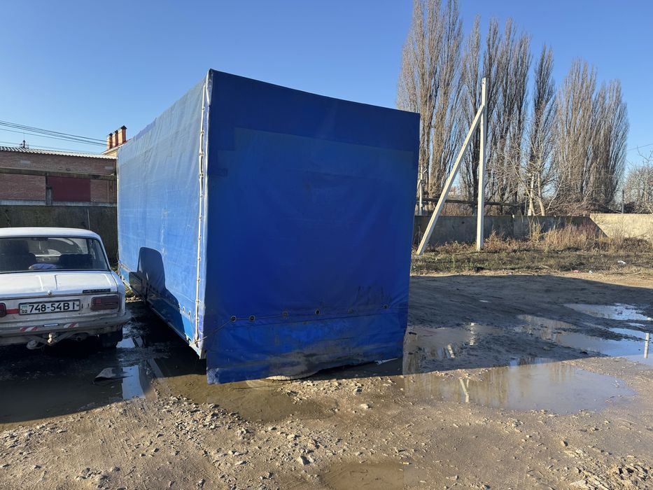 Тентована буда MAN