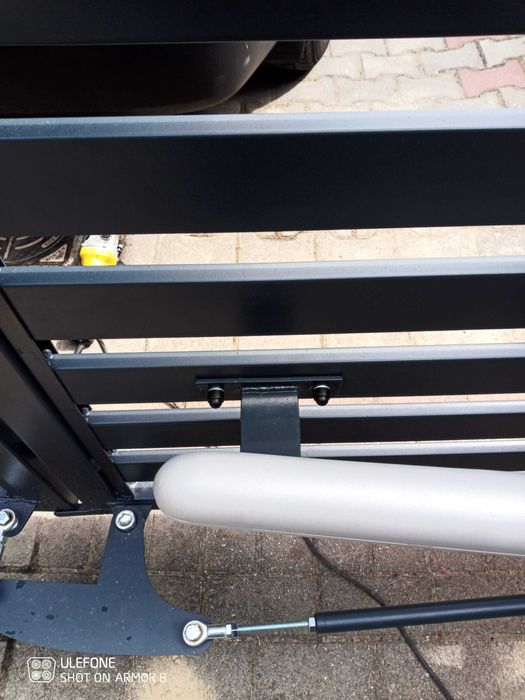 Brama harmonijkowa, brama składana, mechanizm składania skrzydeł bramy