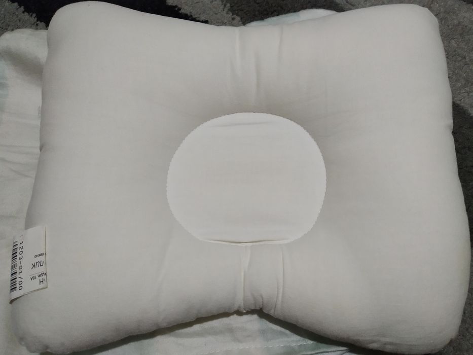 Ортопедическая подушка для новорожденных