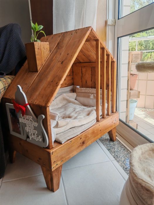 Casa de madeira para animais de estimação
