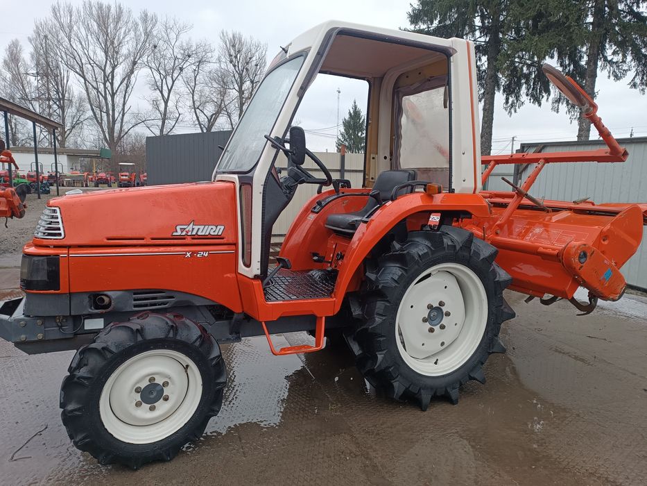 Японський мінітрактор . Трактор Кубота.