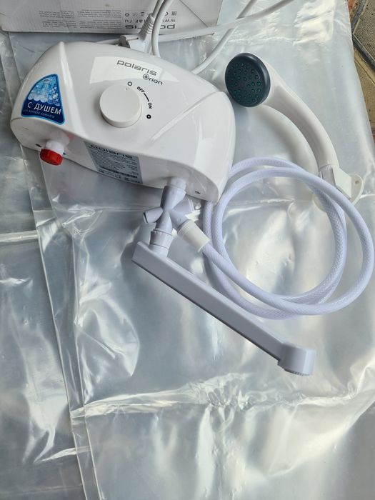 Водонагреватель проточный.