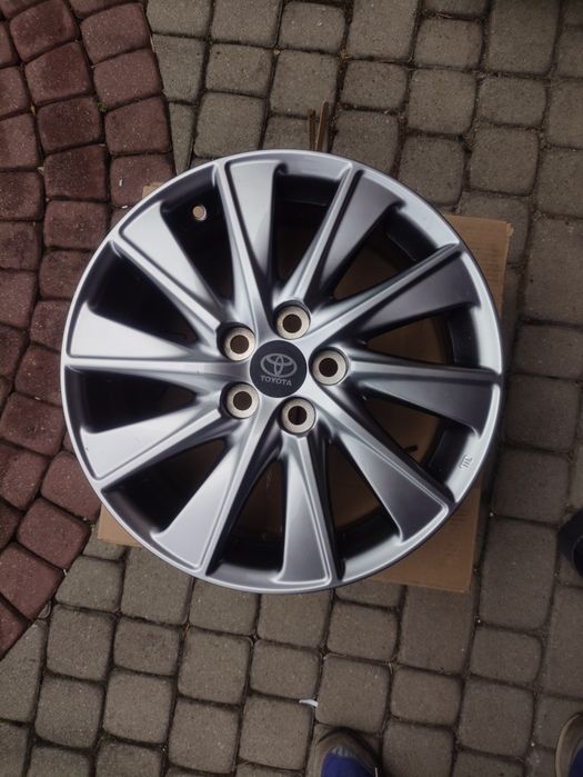 Nowe OEM alufelgi felgi aluminiowe OEM TOYOTA 42611-YP500 6X16 5X100 ET50/54.1 SZARY Yaris prius 16 Avensis T22 Verso