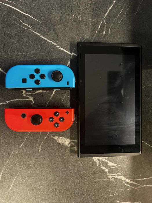 Nintendo Swich + 4 Gry