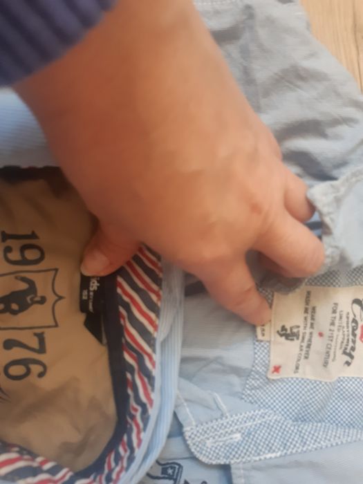 2 koszule błękitne paski 152 oraz 158