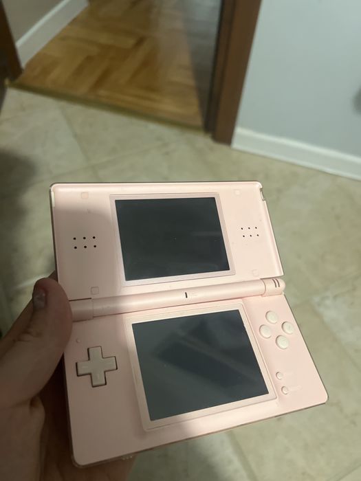Nintendo DS Lite różowy + 9 gier ładowarka case