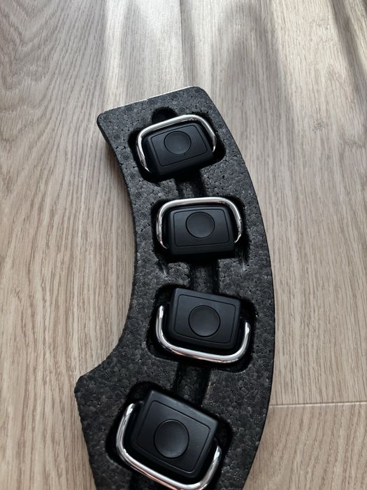 Uchwyty do listw bagaznika Audi