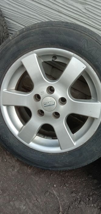 Продам диски с резиной комплект