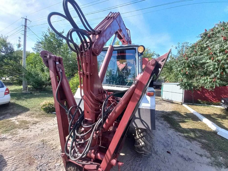 Грейферний погрузчик юмз