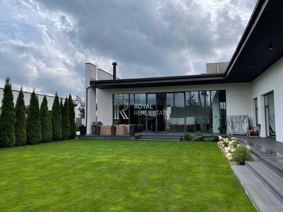 Продаж Будинок Бучанський район КМ «Белгравія» 280 м² 3 спальні Басейн Тераса 100 м² Сауна Джакузі Розумний дім Гараж