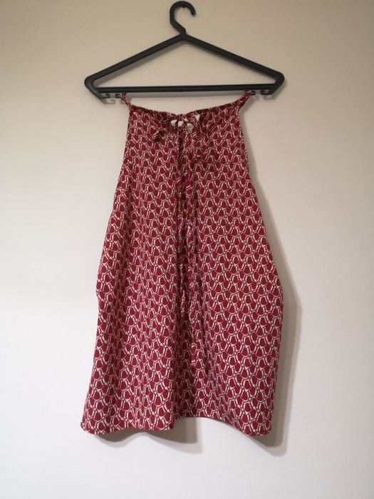 Túnica, tamanho L. Nova.