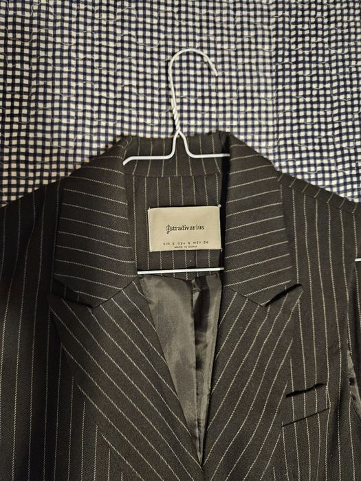 Saia colete, Stradivarius