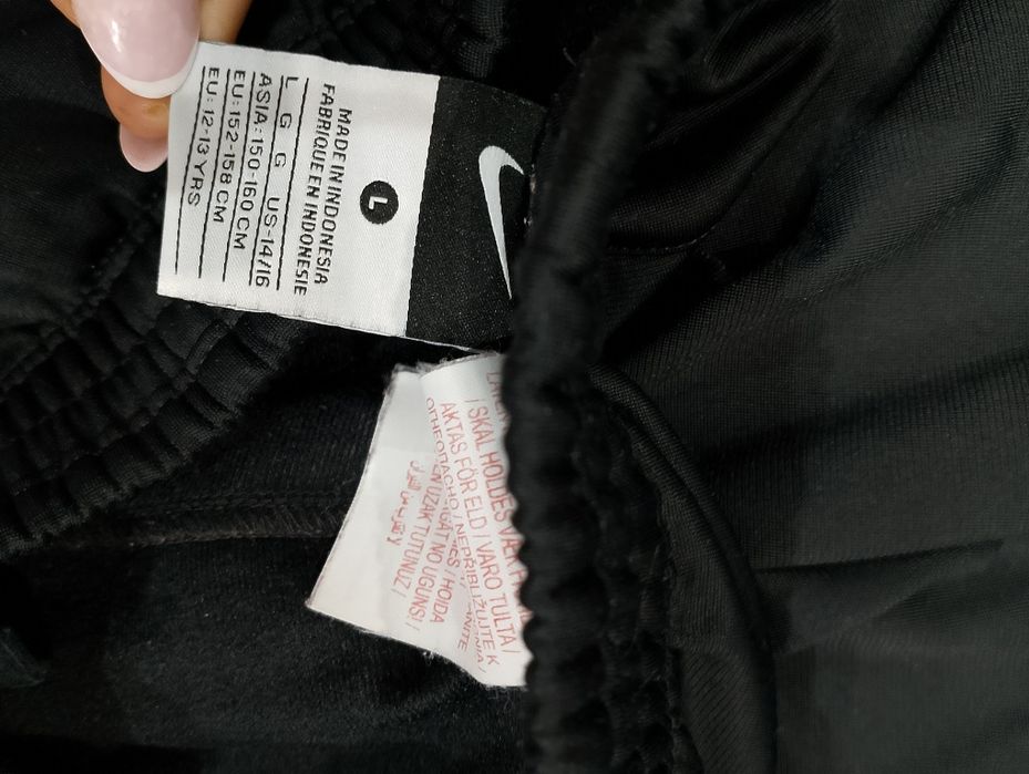 Spodnie dresowe czarne Nike 36/38 ideał
