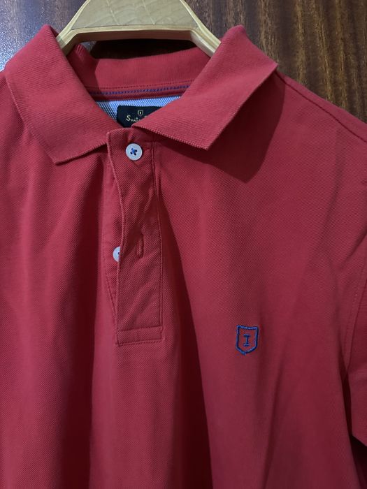 Polo algumas vezes usado mas esta como novo