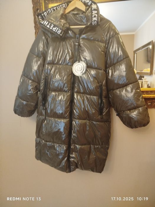 Nowa ciepła długa kurtka