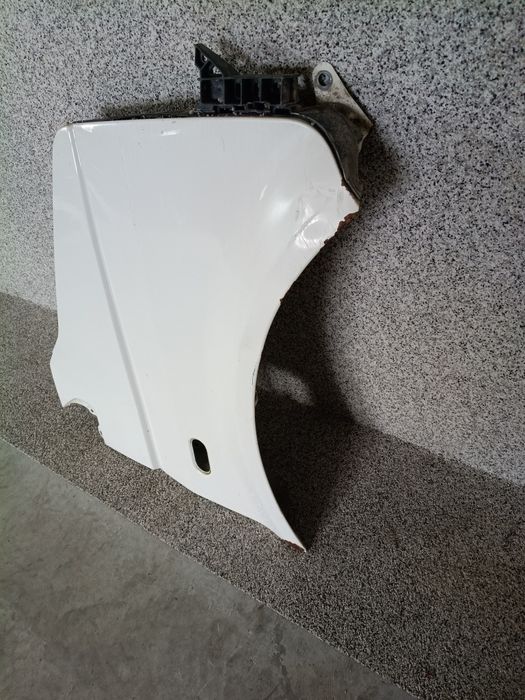 Błotnik prawy VW transporter T5 brak kodu lakieru