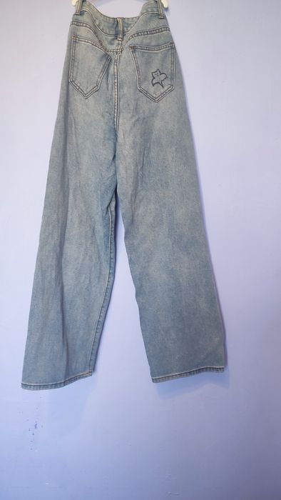 Широкі стильні джинси та рвані