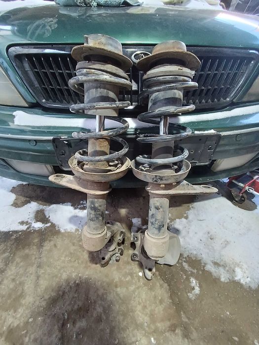 Стойка Нексия N100 Цапфа Стойки в сборе Кулак Амортизатор Daewoo Nexia