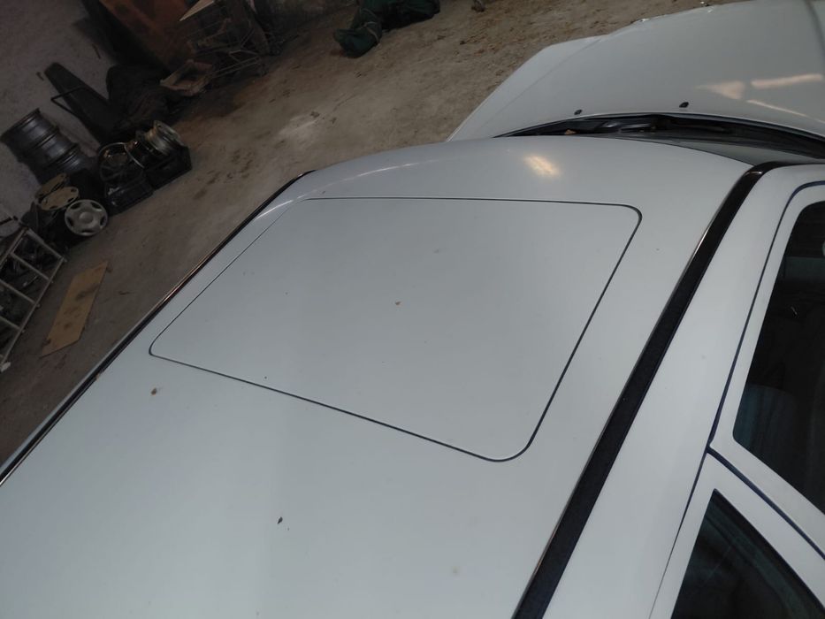 Mercedes 230e.