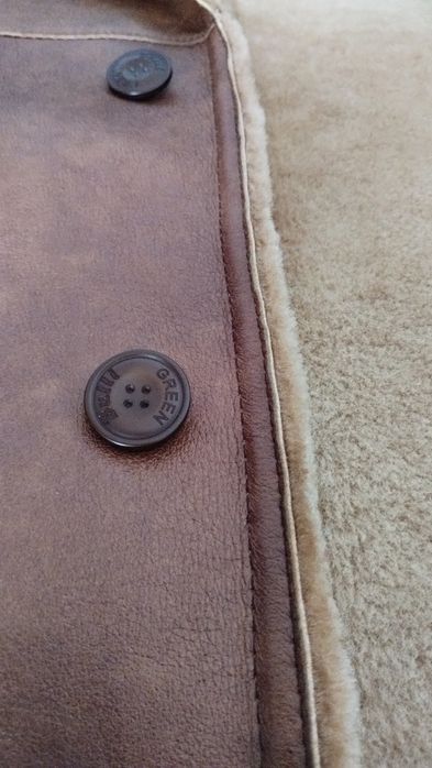 Piękny męski kożuch skórzany.