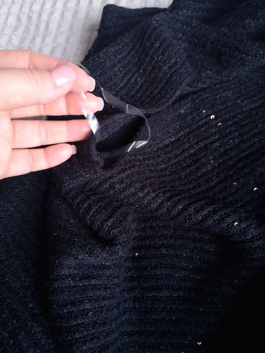 Тепла накидка пончо з китичками