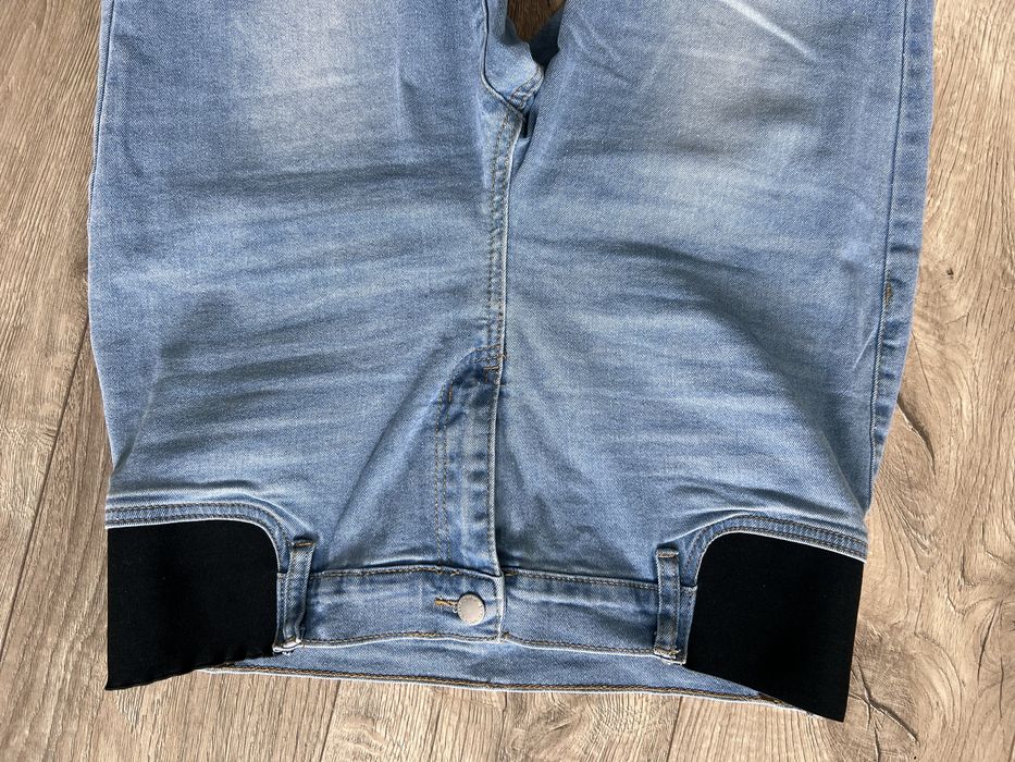 Jeansy ciążowe flare z elastycznymi wstawkami na brzuch