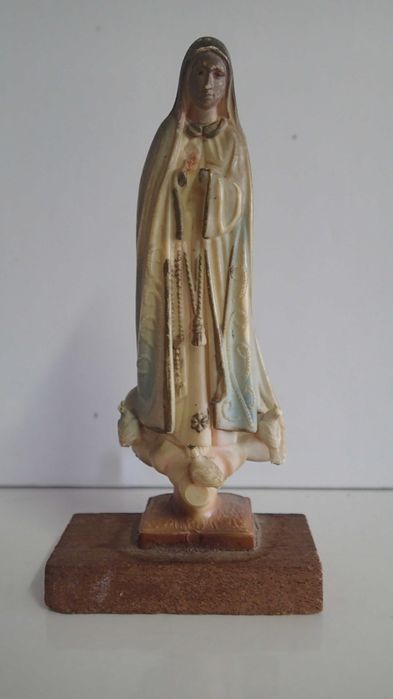 Nossa Senhora antiga em marfinite