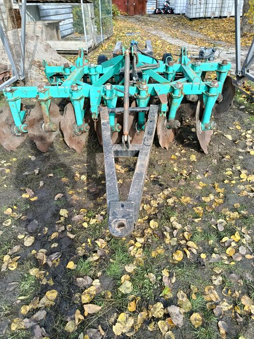 Причіпний пристрій для дискової борони