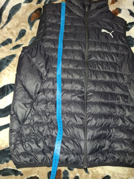 Чоловічий пуховий жилет