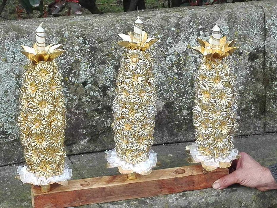 Palmitos e velas de mordoma