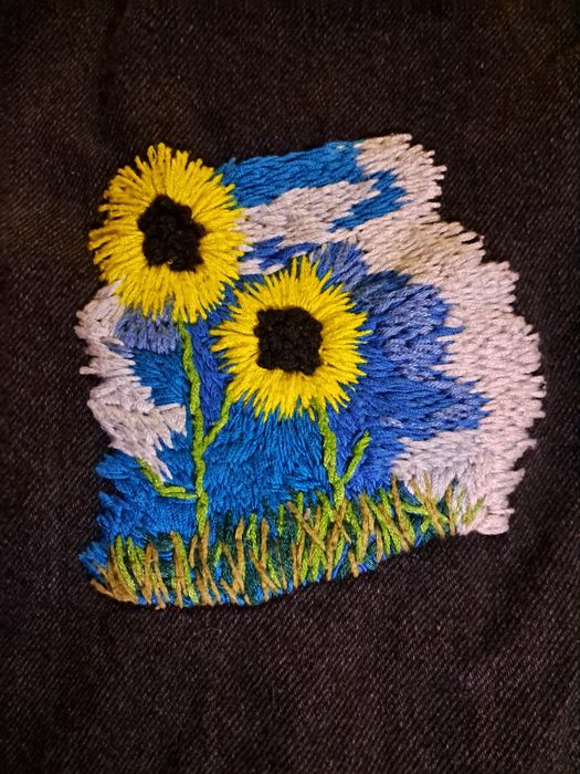 Джинси з ручною вишивкою