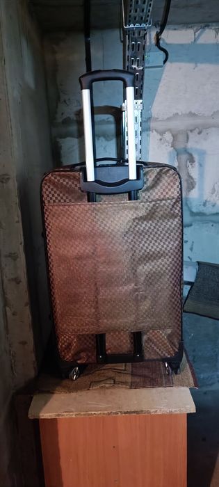 Великий дорожній чемодан тканинний з поліестеру на 4-х колесах