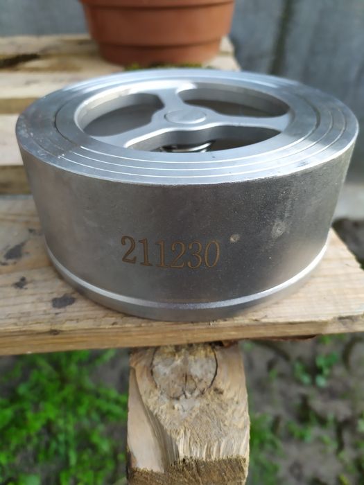 Клапан зворотній міжфланцевий ду 80 нержавіючий.