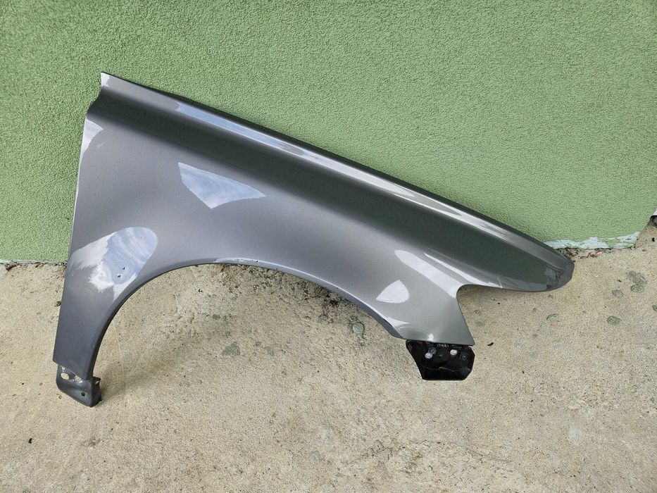 Błotnik prawy przód Volvo S40/V50 szary kod lakieru 462-42