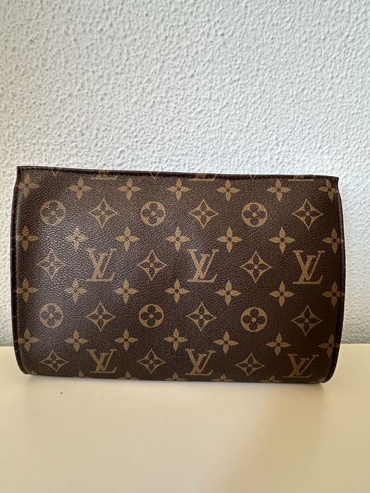 Pochette de mão da marca  LV