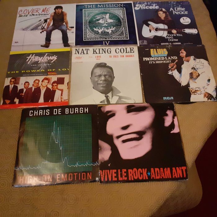 Singles-Chris De Burgh, Elvis, The Mission e outros