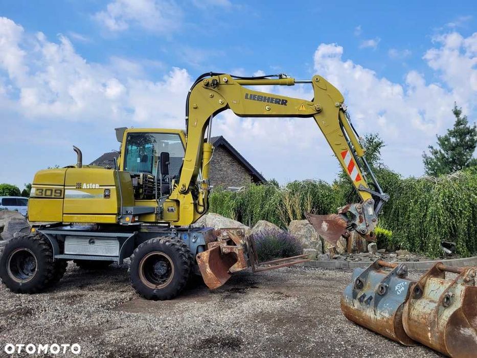 LIEBHERR 309 Klima, 4 łyżki + widły, Nowe opony! Kamera