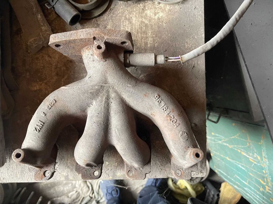 Выпускной коллектор на Шевроле Авео Т250 1.5