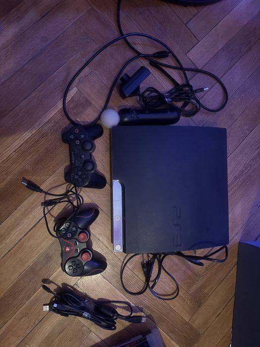 PS3 + gry + dwa pady + kamera do ruchu