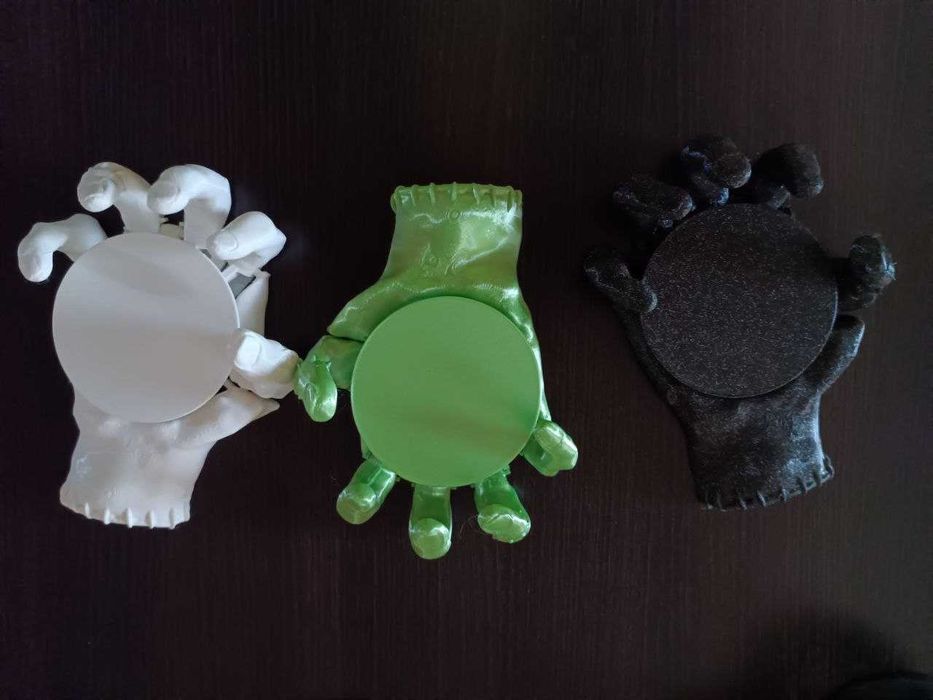 Podkładka ręka 3D zaciskająca się pod świeczkę , kubek , szklankę, etc