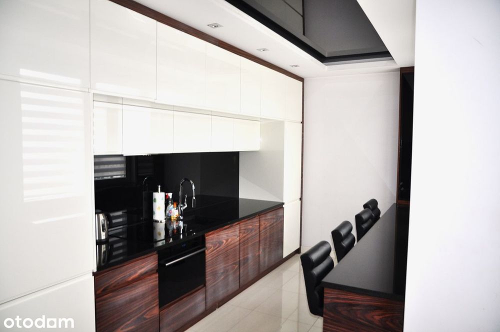 Komfortowe mieszkanie 48,5m² z tarasem – wysoki standard, garaż, winda